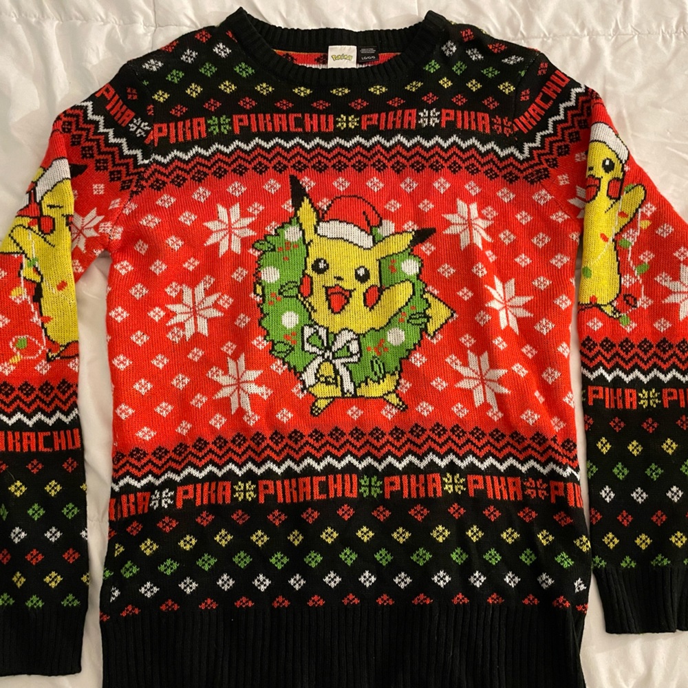 Pokémon men’s Christmas sweater size L. never worn.